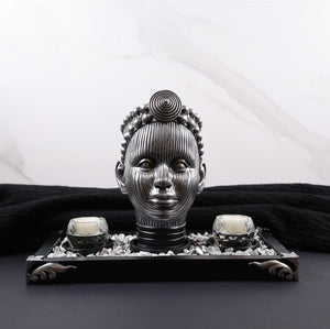 Olokun Head Platinum Silver Ornament with black and silver tinted decorative tray.